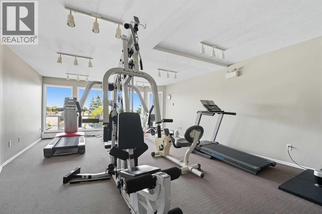 208, 6118 53 Avenue, Red Deer, AB - Indoor Photo Showing Gym Room
