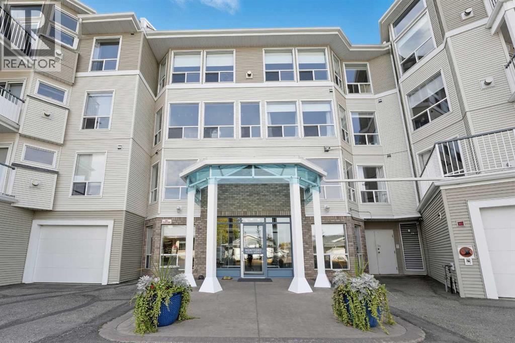 208, 6118 53 Avenue, Red Deer, AB - Outdoor With Balcony With Facade