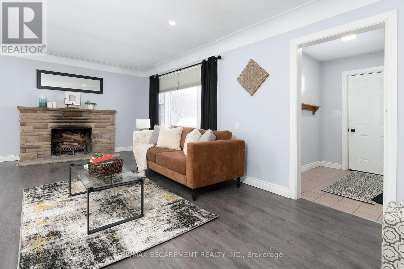 2448 Wilson Street W, Hamilton, ON - Indoor Photo Showing Living Room With Fireplace