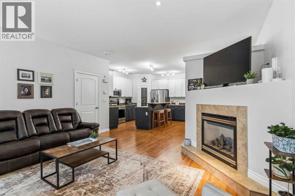 137 Sunday Creek Way, Fort Mcmurray, AB - Indoor Photo Showing Living Room With Fireplace