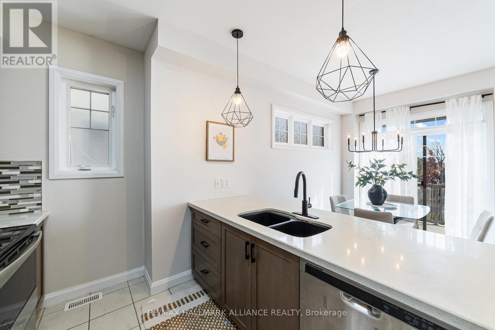 #45 - 1169 Garner Road E, Hamilton, ON - Indoor Photo Showing Kitchen With Double Sink
