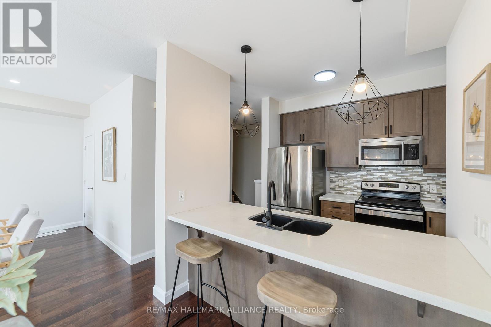 #45 - 1169 Garner Road E, Hamilton, ON - Indoor Photo Showing Kitchen With Stainless Steel Kitchen With Double Sink With Upgraded Kitchen