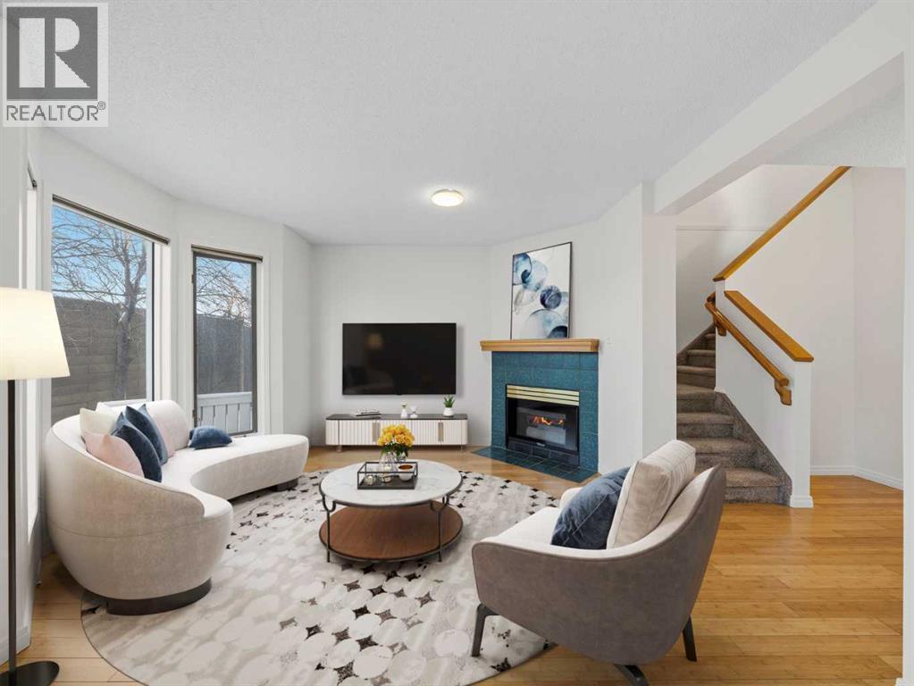 Virtual Staging - 626 Hawkstone Manor Nw, Calgary, AB - Indoor Photo Showing Living Room With Fireplace