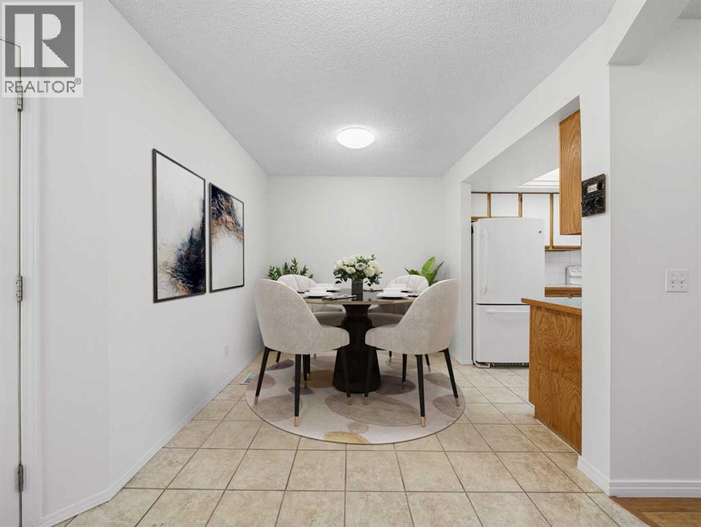Virtually Staged - 626 Hawkstone Manor Nw, Calgary, AB - Indoor Photo Showing Dining Room