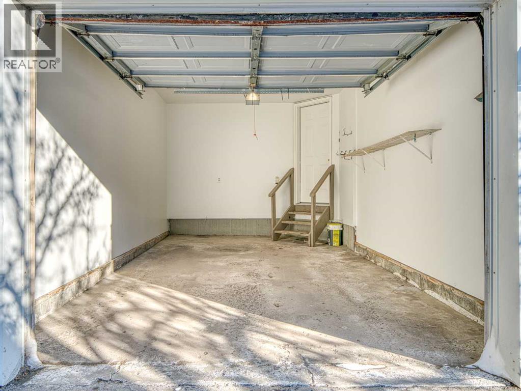 626 Hawkstone Manor Nw, Calgary, AB - Indoor Photo Showing Garage