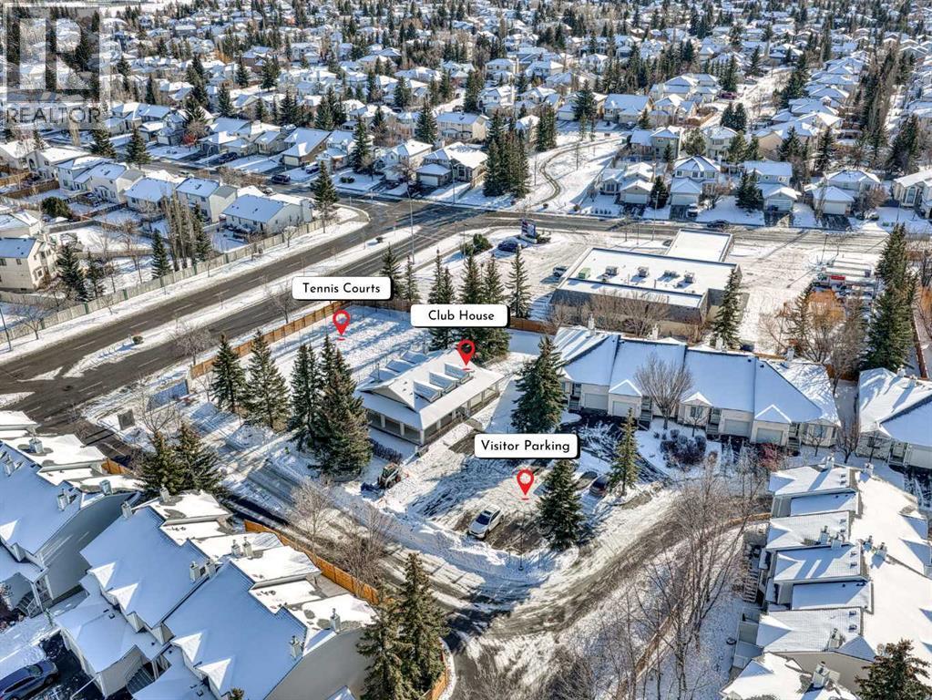 Club House, Tennis Courts and Visitor Parking - 626 Hawkstone Manor Nw, Calgary, AB - Outdoor With View