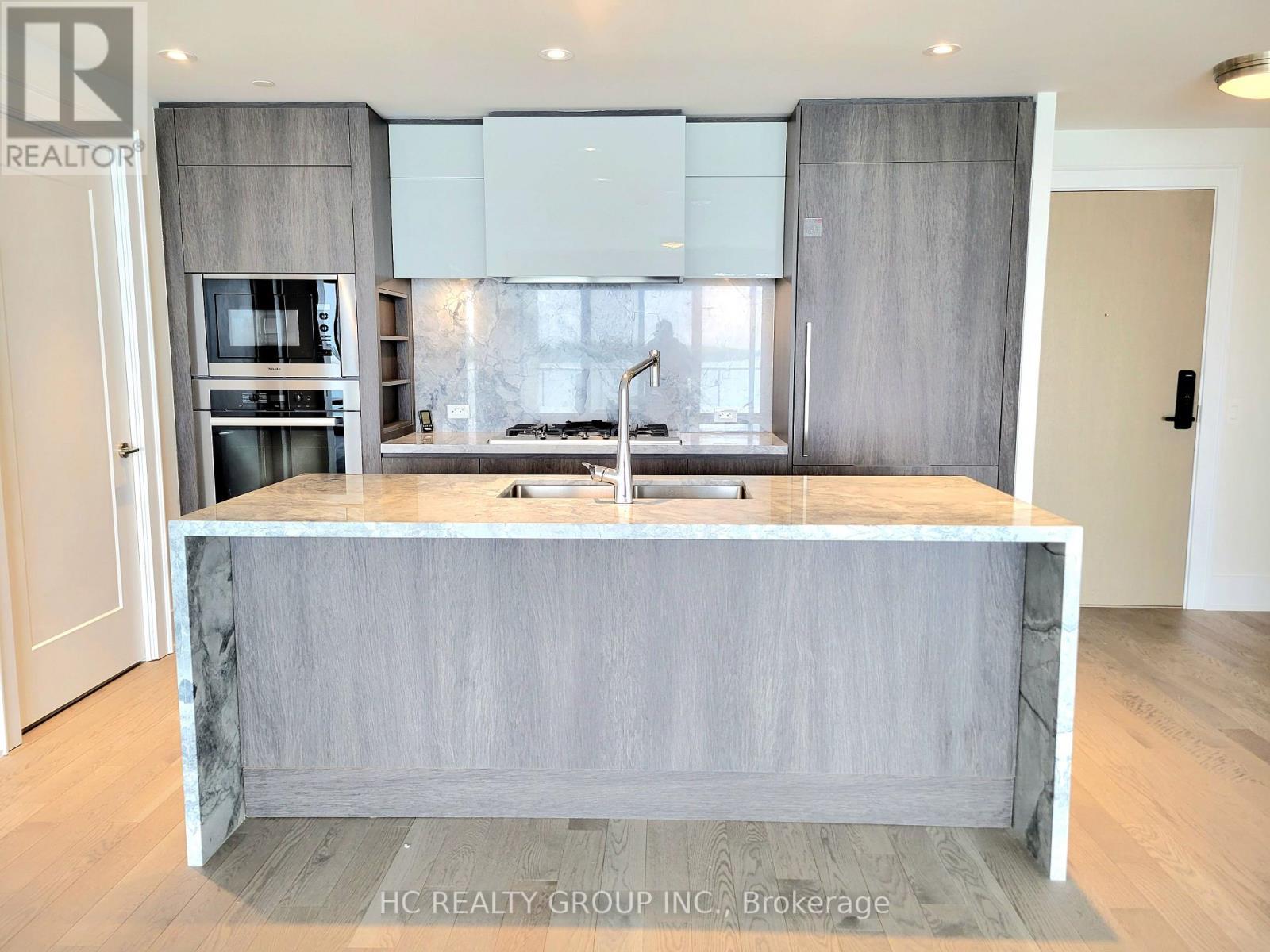 309 - 118 Merchants Wharf Avenue, Toronto, ON - Indoor Photo Showing Kitchen With Double Sink With Upgraded Kitchen