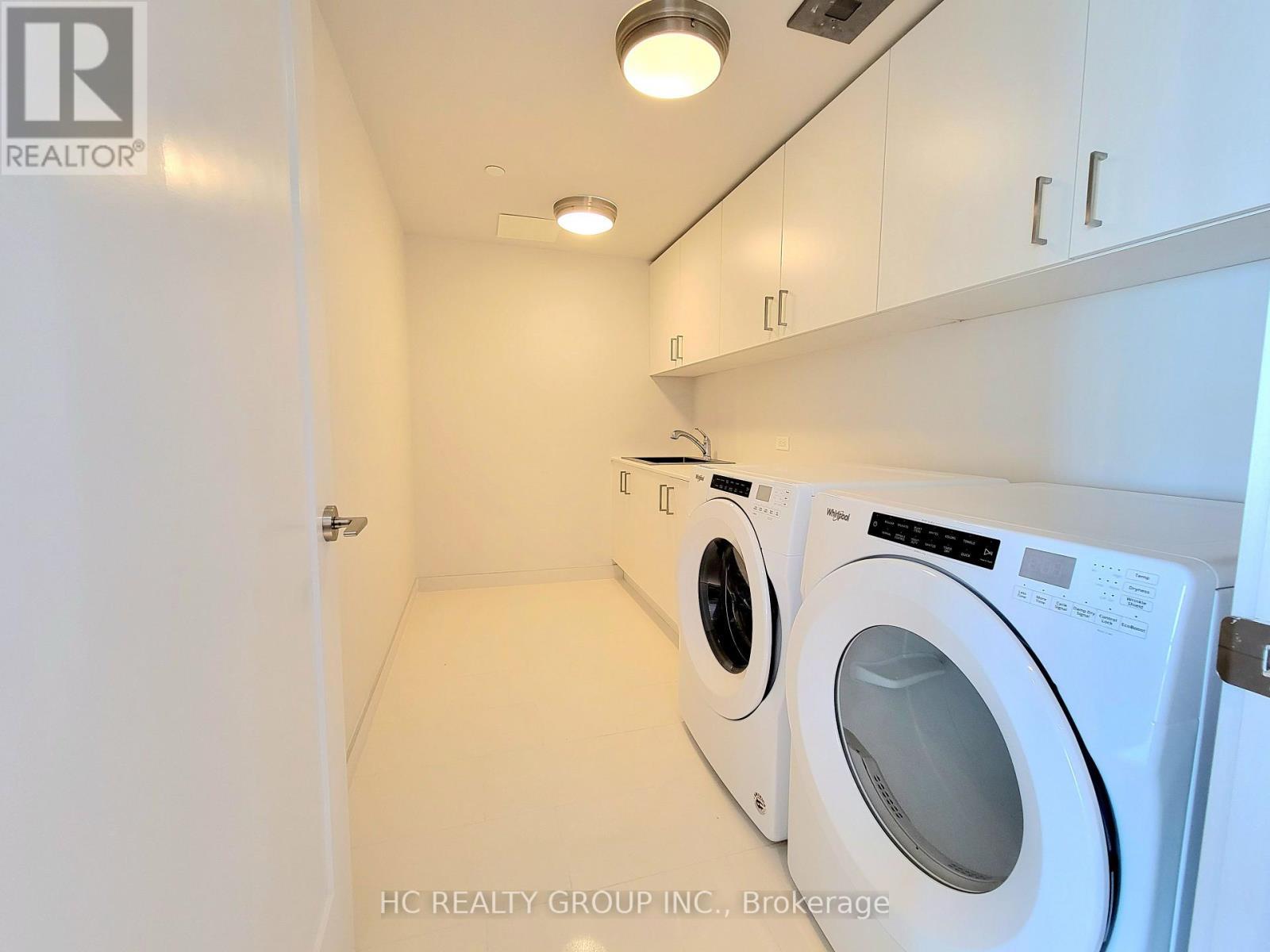 309 - 118 Merchants Wharf Avenue, Toronto, ON - Indoor Photo Showing Laundry Room