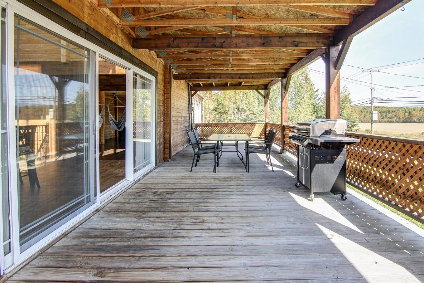 Extérieur - 6901 Boul. Martel, Saint-Honoré, QC - Outdoor With Deck Patio Veranda With Exterior