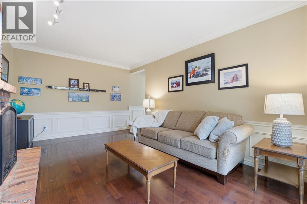 Back family room with hardwood flooring - 84 Chatterson Drive, Ancaster, ON - Indoor Photo Showing Living Room