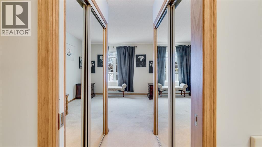 Tons of closet space - 42, 105 Elm Place, Okotoks, AB - Indoor Photo Showing Other Room