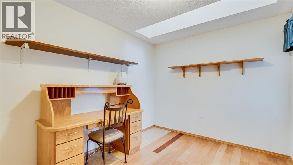 2nd bedroom - 42, 105 Elm Place, Okotoks, AB - Indoor Photo Showing Other Room