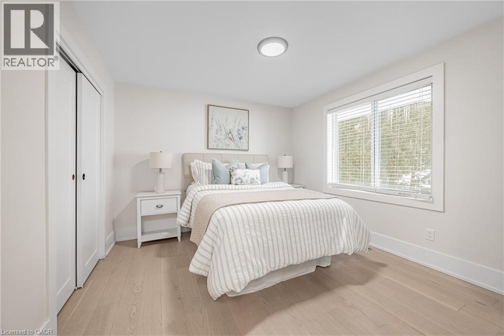 Bedroom with light wood finished floors and a closet - 248 Wales Crescent, Oakville, ON - Indoor Photo Showing Bedroom