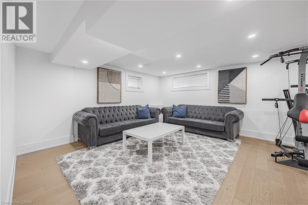Living area with light wood finished floors and recessed lighting - 248 Wales Crescent, Oakville, ON - Indoor