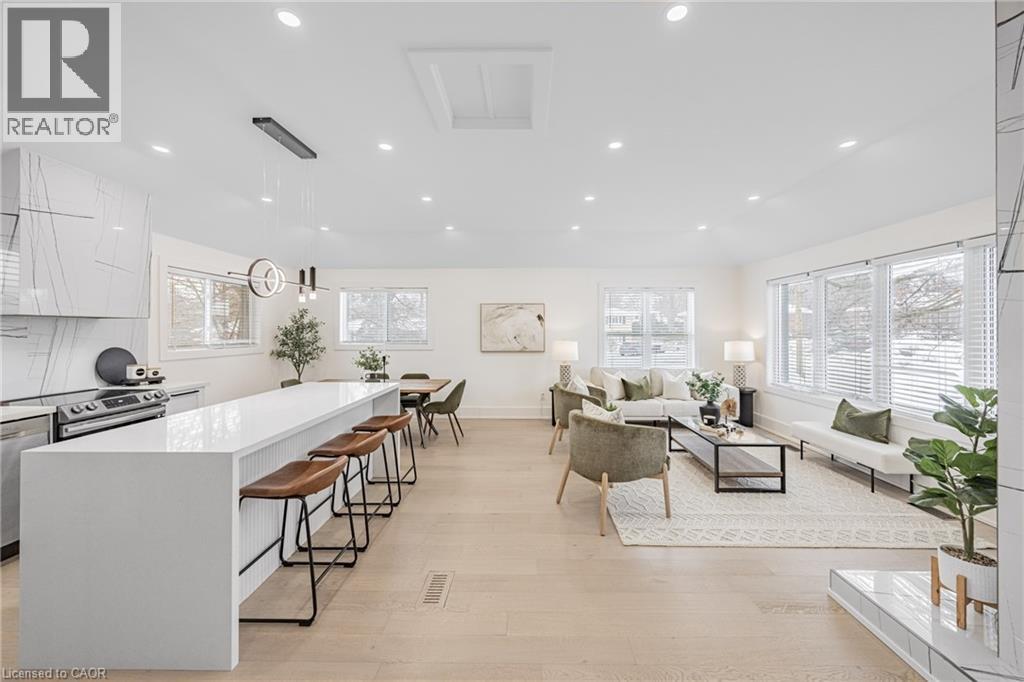 Living area with recessed lighting and light wood-style flooring - 248 Wales Crescent, Oakville, ON - Indoor