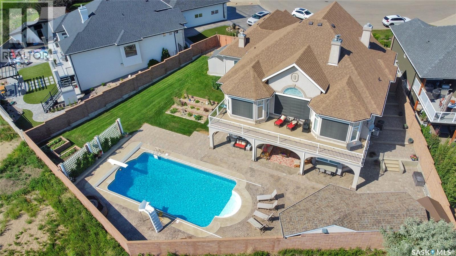 1453 Normandy Drive, Moose Jaw, SK - Outdoor With In Ground Pool