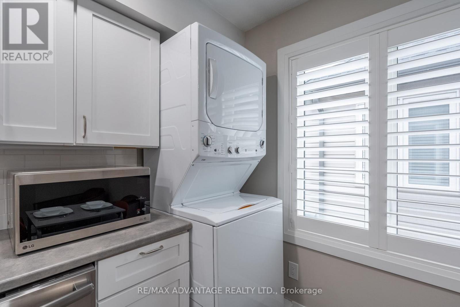 Upper - 30 Compass Trail, Central Elgin, ON - Indoor Photo Showing Laundry Room