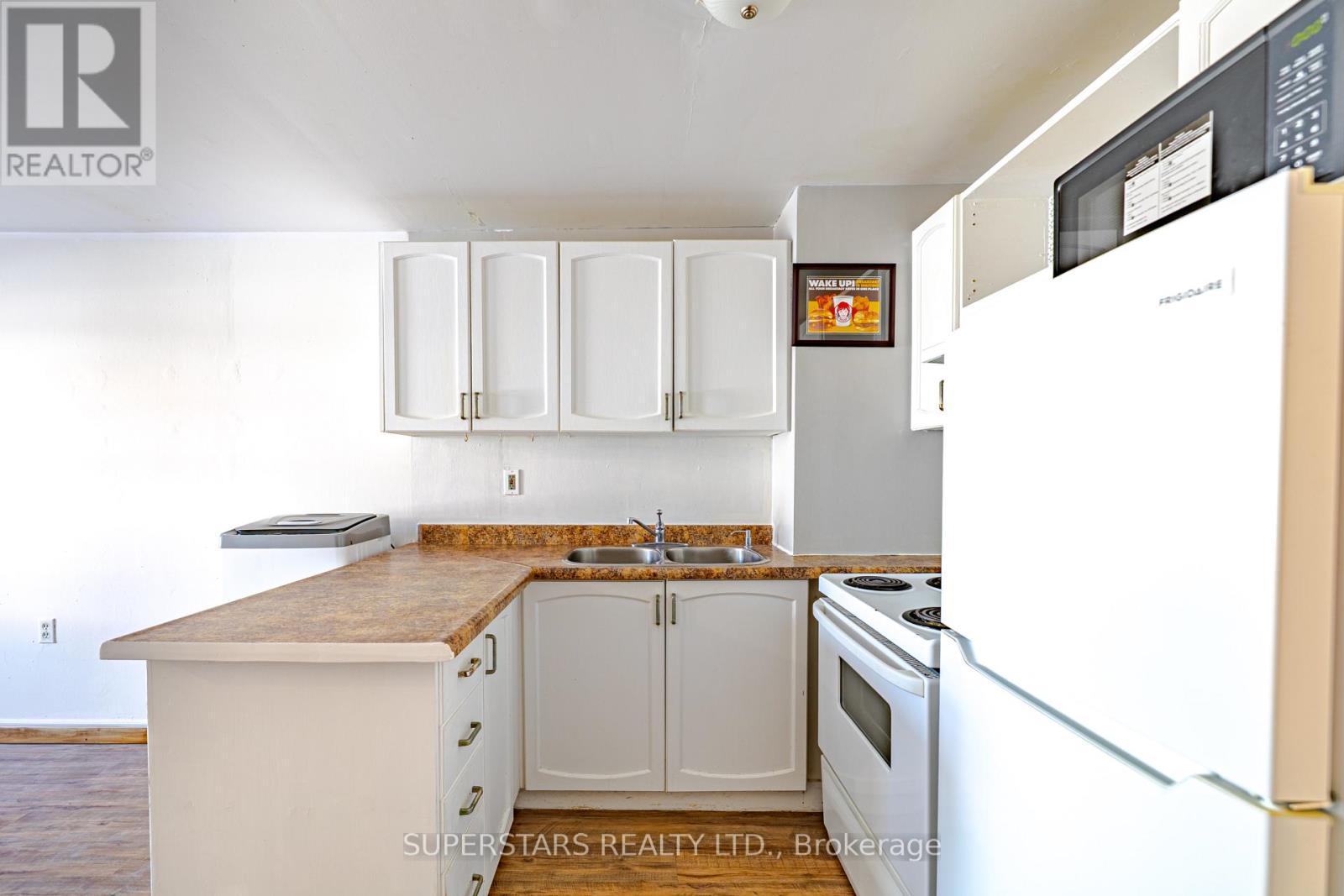 165 1/2 Olive Avenue, Oshawa, ON - Indoor Photo Showing Kitchen With Double Sink