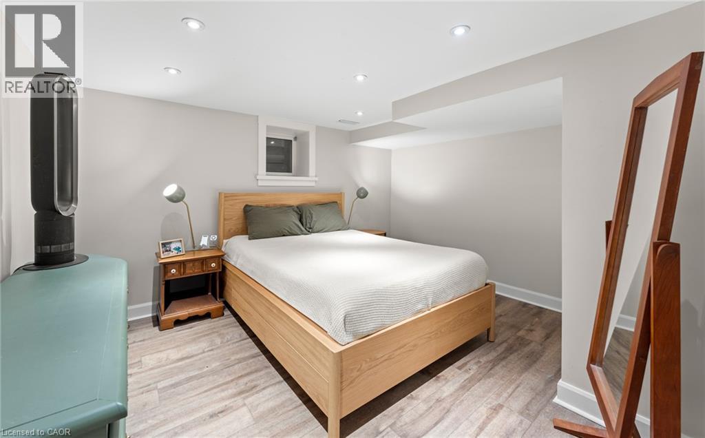 Bedroom featuring recessed lighting and light wood-style flooring - 58 Hohner Avenue, Kitchener, ON - Indoor Photo Showing Bedroom
