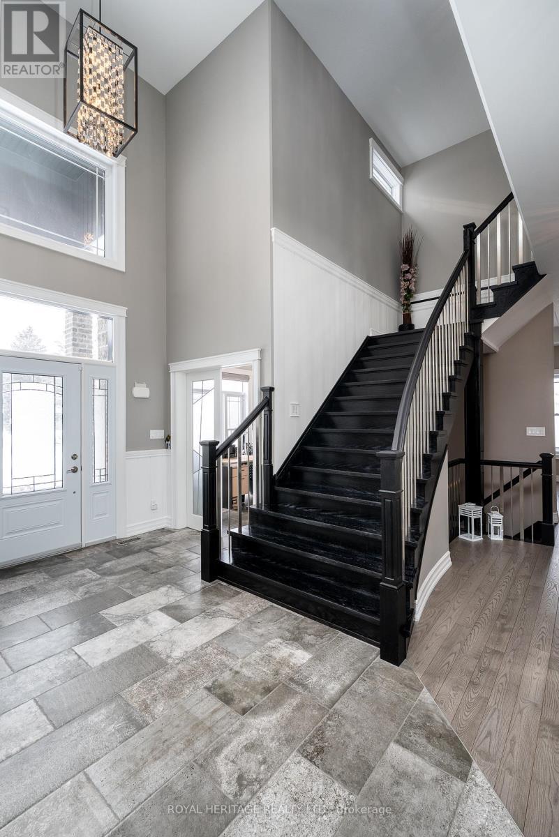 Custom Wood/Stainless Steel Staircase - 21564 Loyalist Parkway, Prince Edward County (Ameliasburg Ward), ON - Indoor Photo Showing Other Room