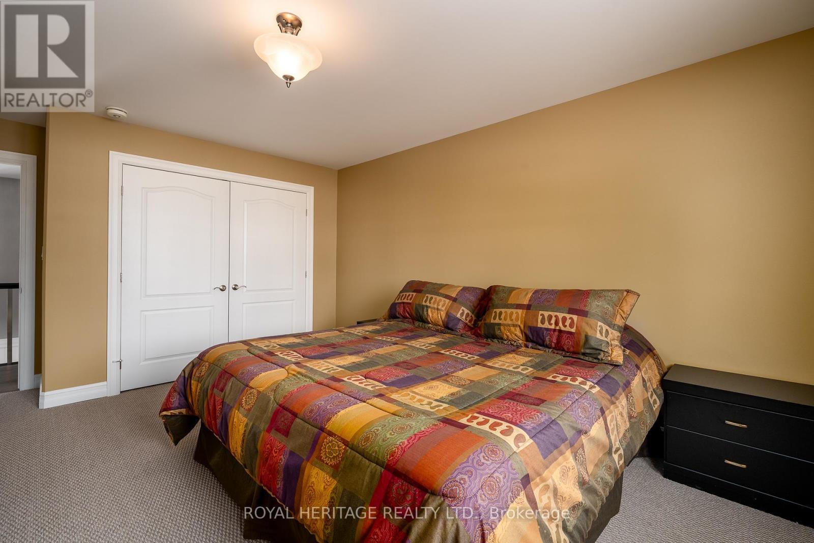 Double Closet - 21564 Loyalist Parkway, Prince Edward County (Ameliasburg Ward), ON - Indoor Photo Showing Bedroom