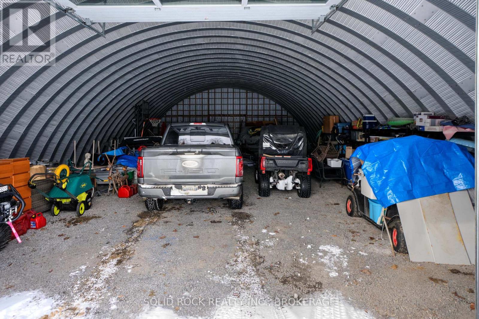 3645 Murvale Road, Frontenac (Frontenac South), ON - Indoor Photo Showing Garage