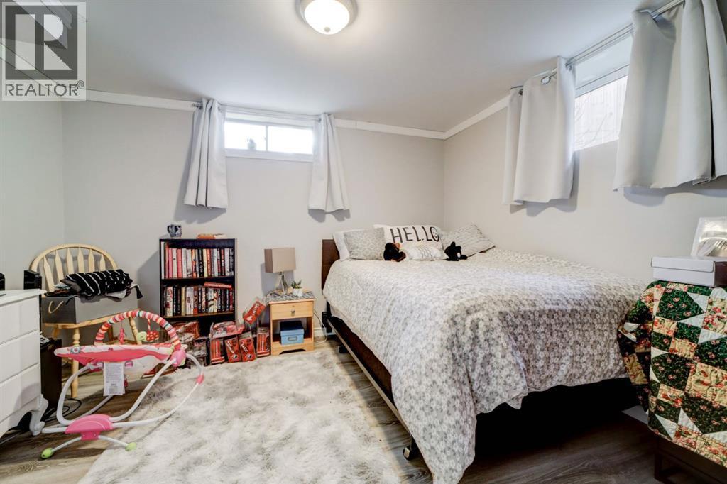Basement Bedroom - 1510 12 Avenue N, Lethbridge, AB - Indoor Photo Showing Bedroom