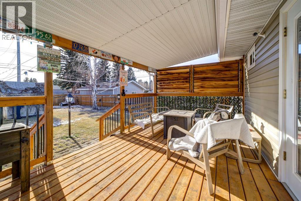 Back Covered Deck - 1510 12 Avenue N, Lethbridge, AB - Outdoor With Deck Patio Veranda With Exterior