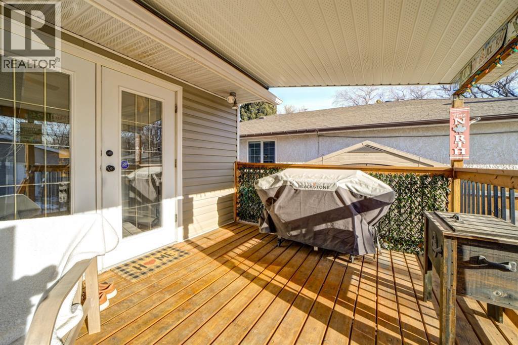Back Covered Deck - 1510 12 Avenue N, Lethbridge, AB - Outdoor With Deck Patio Veranda With Exterior