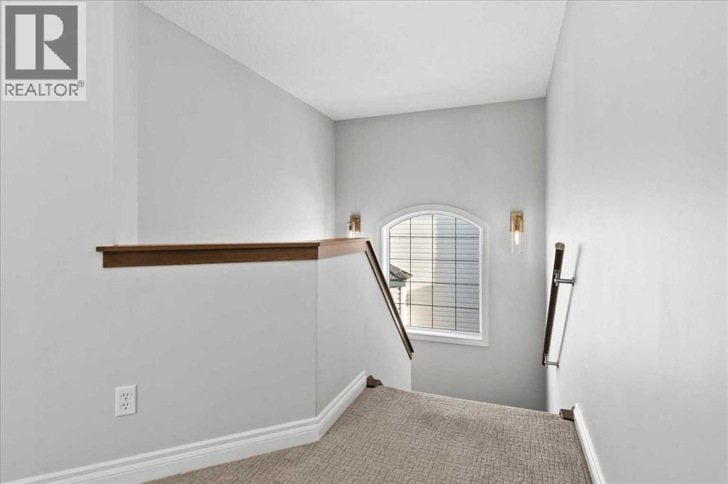 255 Gleneagles View, Cochrane, AB - Indoor Photo Showing Other Room