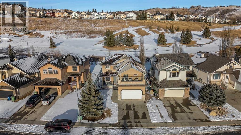 255 Gleneagles View, Cochrane, AB - Outdoor With Facade