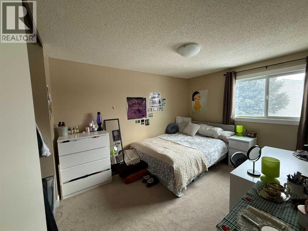 7, 65 Lafayette Boulevard, Lethbridge, AB - Indoor Photo Showing Bedroom