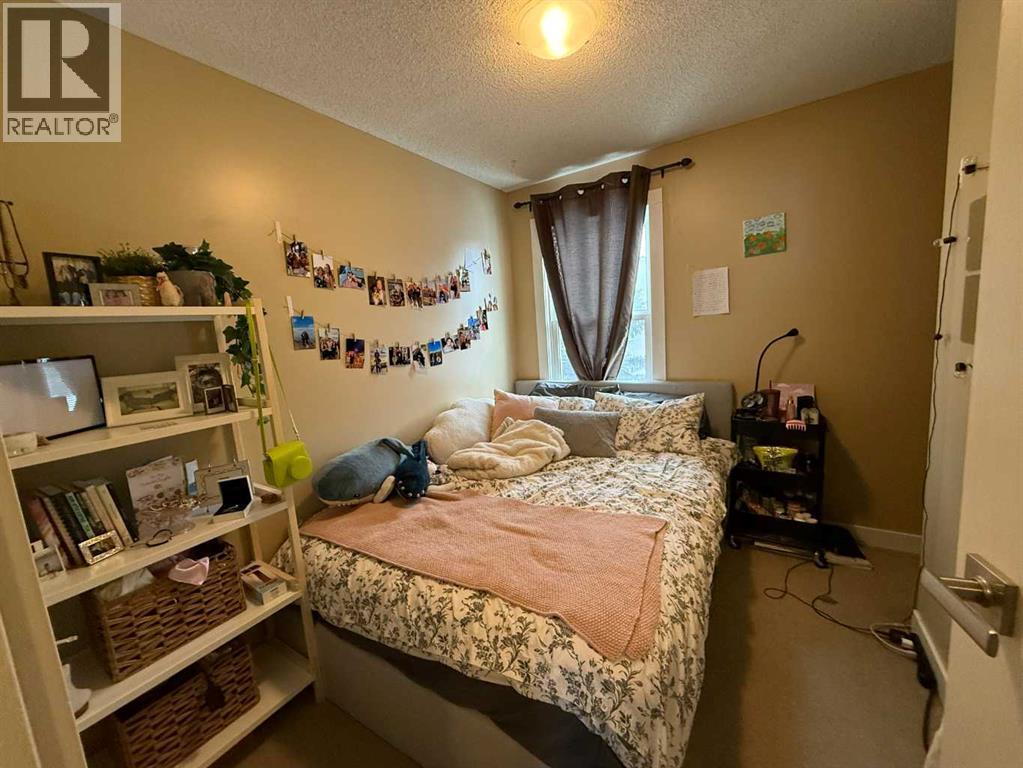 7, 65 Lafayette Boulevard, Lethbridge, AB - Indoor Photo Showing Bedroom