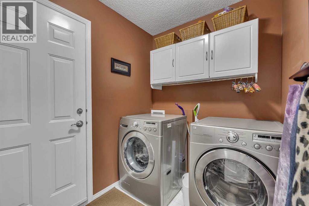103 Panamount Crescent Nw, Calgary, AB - Indoor Photo Showing Laundry Room