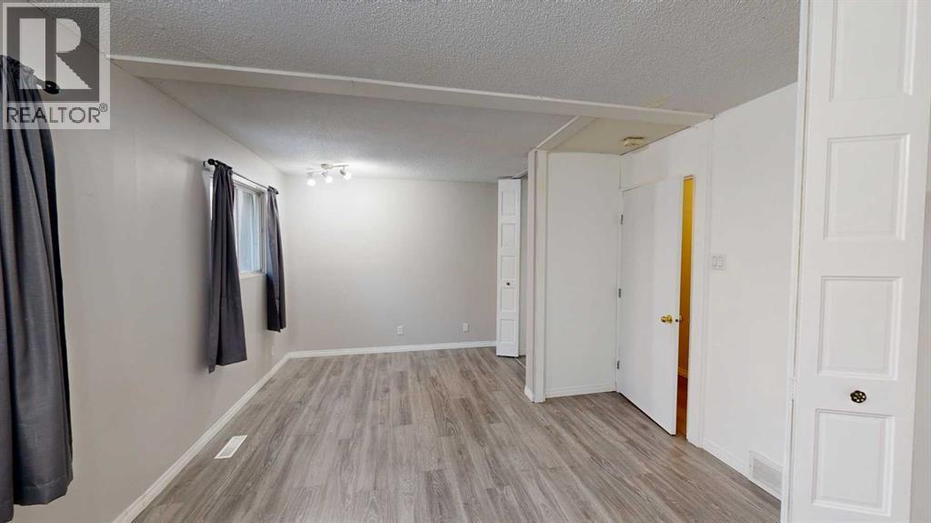 1, 115 Lafayette Boulevard W, Lethbridge, AB - Indoor Photo Showing Other Room