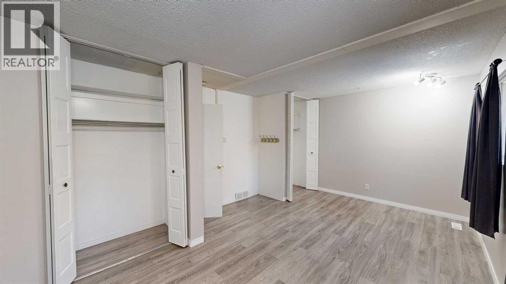 1, 115 Lafayette Boulevard W, Lethbridge, AB - Indoor Photo Showing Other Room