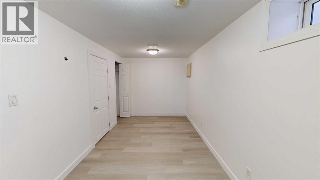 1, 115 Lafayette Boulevard W, Lethbridge, AB - Indoor Photo Showing Other Room