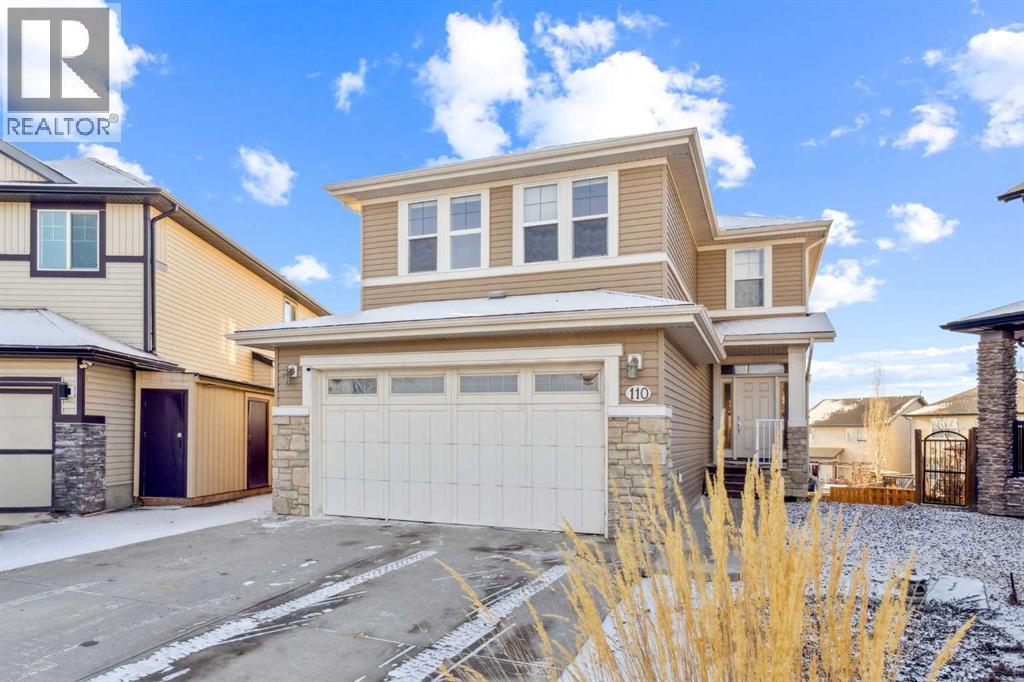 Front #2 - 110 Heritage Place Ne, Cochrane, AB - Outdoor With Facade