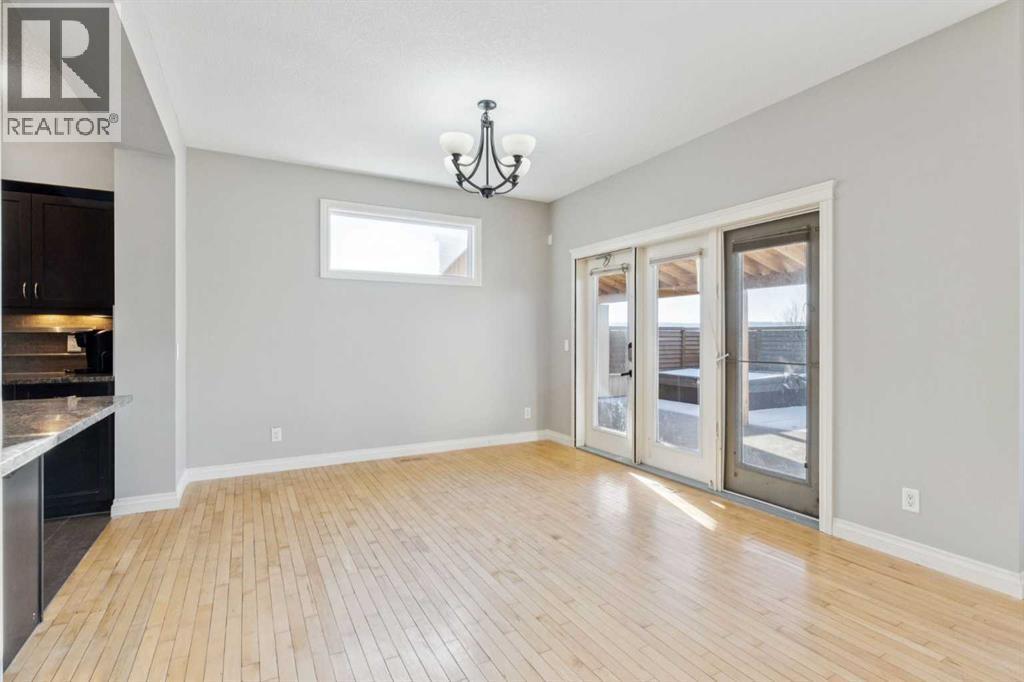 Dining Area - 110 Heritage Place Ne, Cochrane, AB - Indoor Photo Showing Other Room