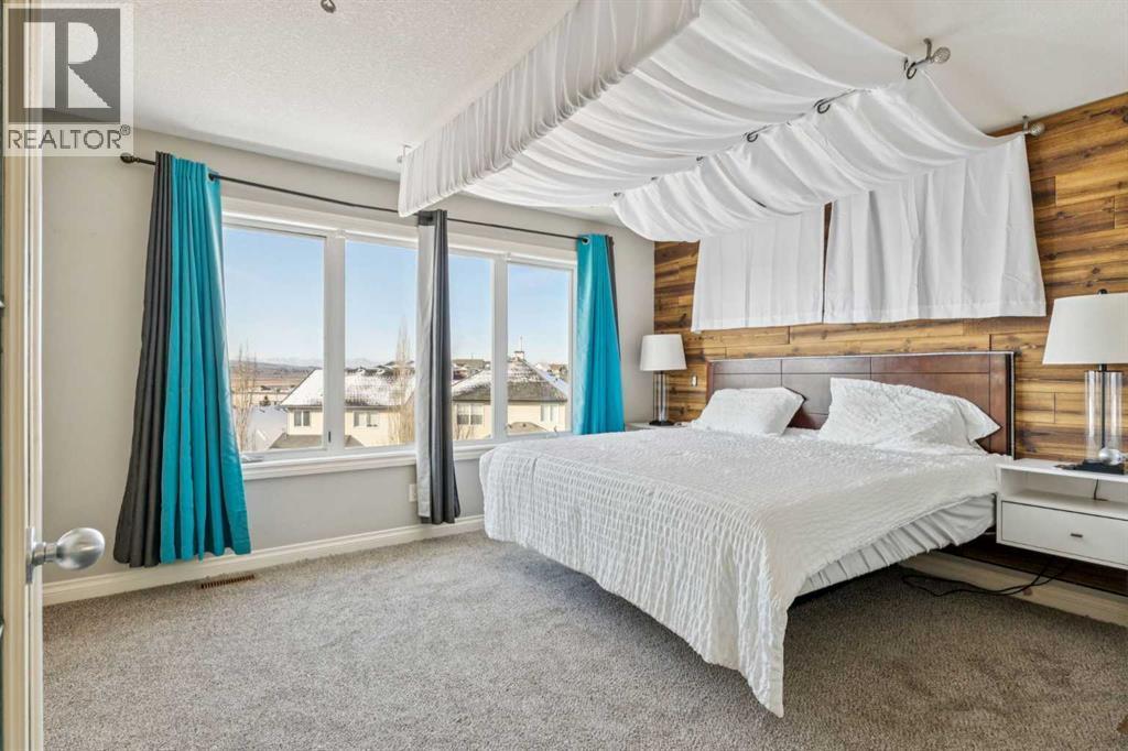 Master Suite - 110 Heritage Place Ne, Cochrane, AB - Indoor Photo Showing Bedroom
