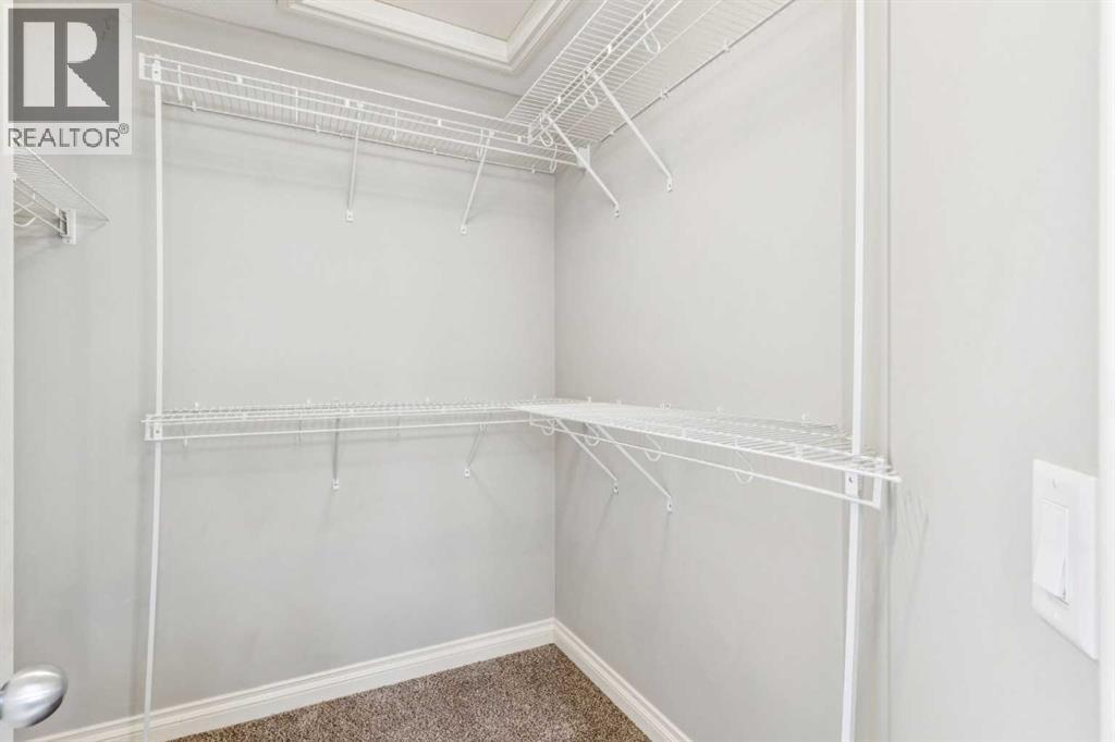 110 Heritage Place Ne, Cochrane, AB - Indoor With Storage