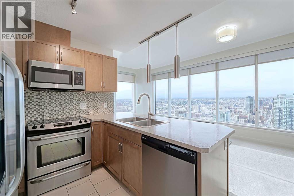2804, 1320 1 Street Se, Calgary, AB - Indoor Photo Showing Kitchen With Stainless Steel Kitchen With Double Sink With Upgraded Kitchen