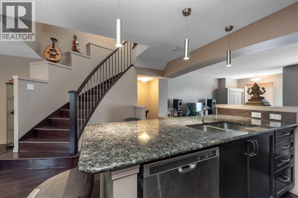 54 Cranford Bay Se, Calgary, AB - Indoor Photo Showing Kitchen With Double Sink