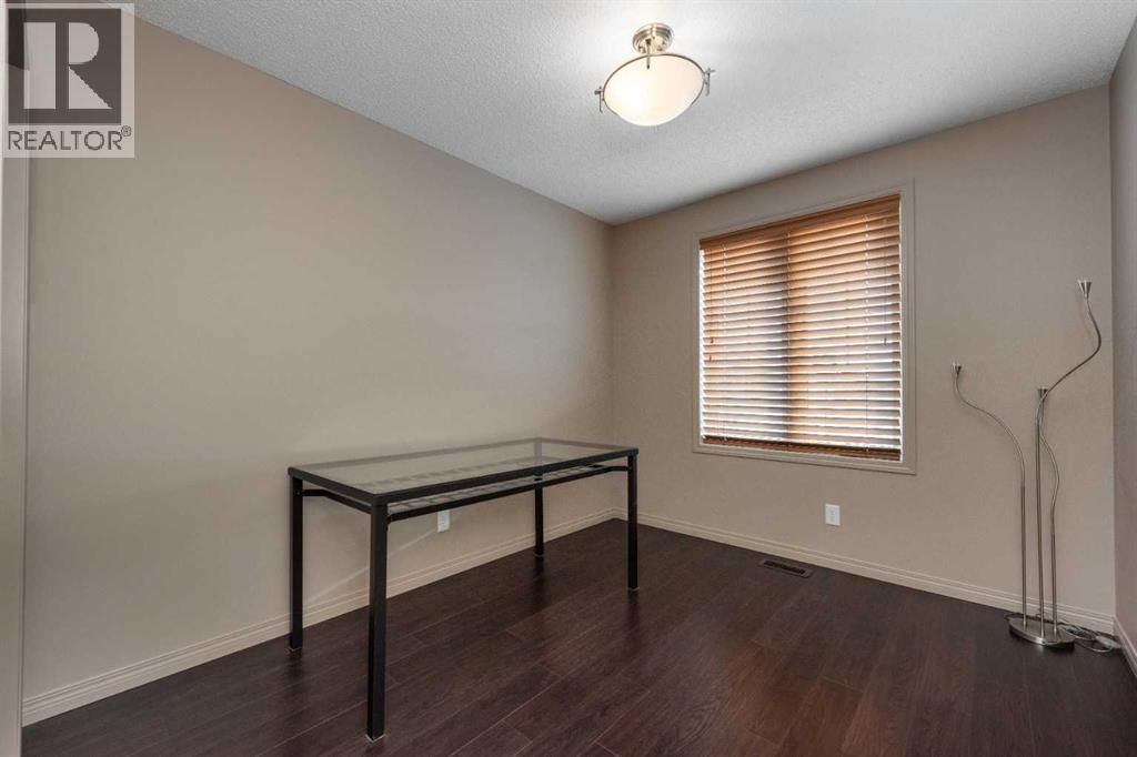 54 Cranford Bay Se, Calgary, AB - Indoor Photo Showing Other Room