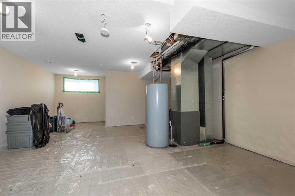 54 Cranford Bay Se, Calgary, AB - Indoor Photo Showing Basement
