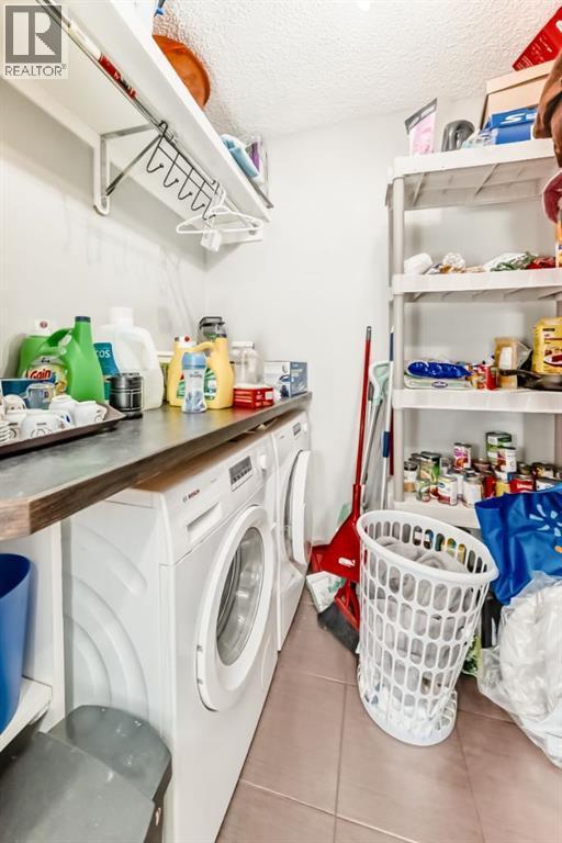 306, 1712 38 Street Se, Calgary, AB - Indoor Photo Showing Laundry Room