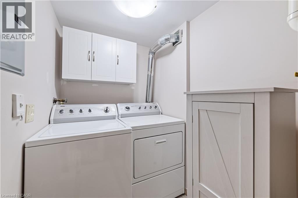 Convenient in suite laundry - 216 Plains Road W Unit# B403, Burlington, ON - Indoor Photo Showing Laundry Room
