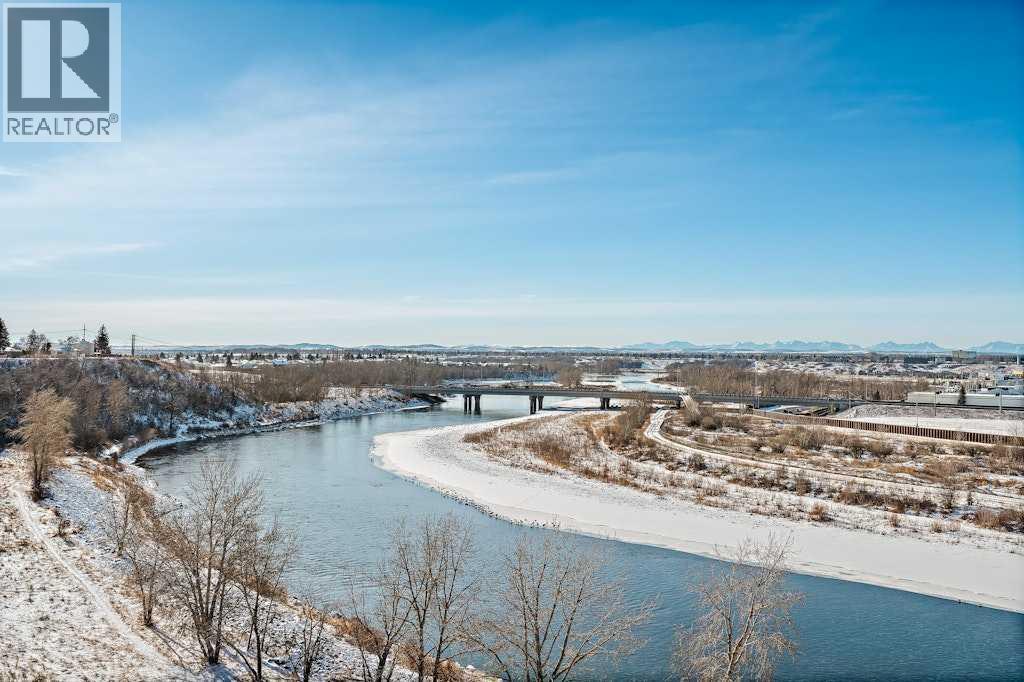 108 Lynnbrook Bay Se, Calgary, AB - Outdoor With Body Of Water With View