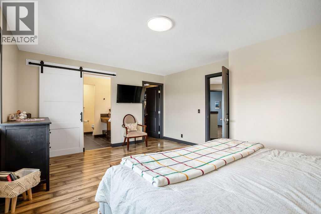 6 Westmount Circle, Okotoks, AB - Indoor Photo Showing Bedroom