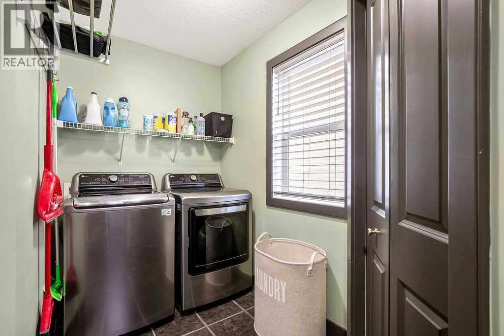 6 Westmount Circle, Okotoks, AB - Indoor Photo Showing Laundry Room